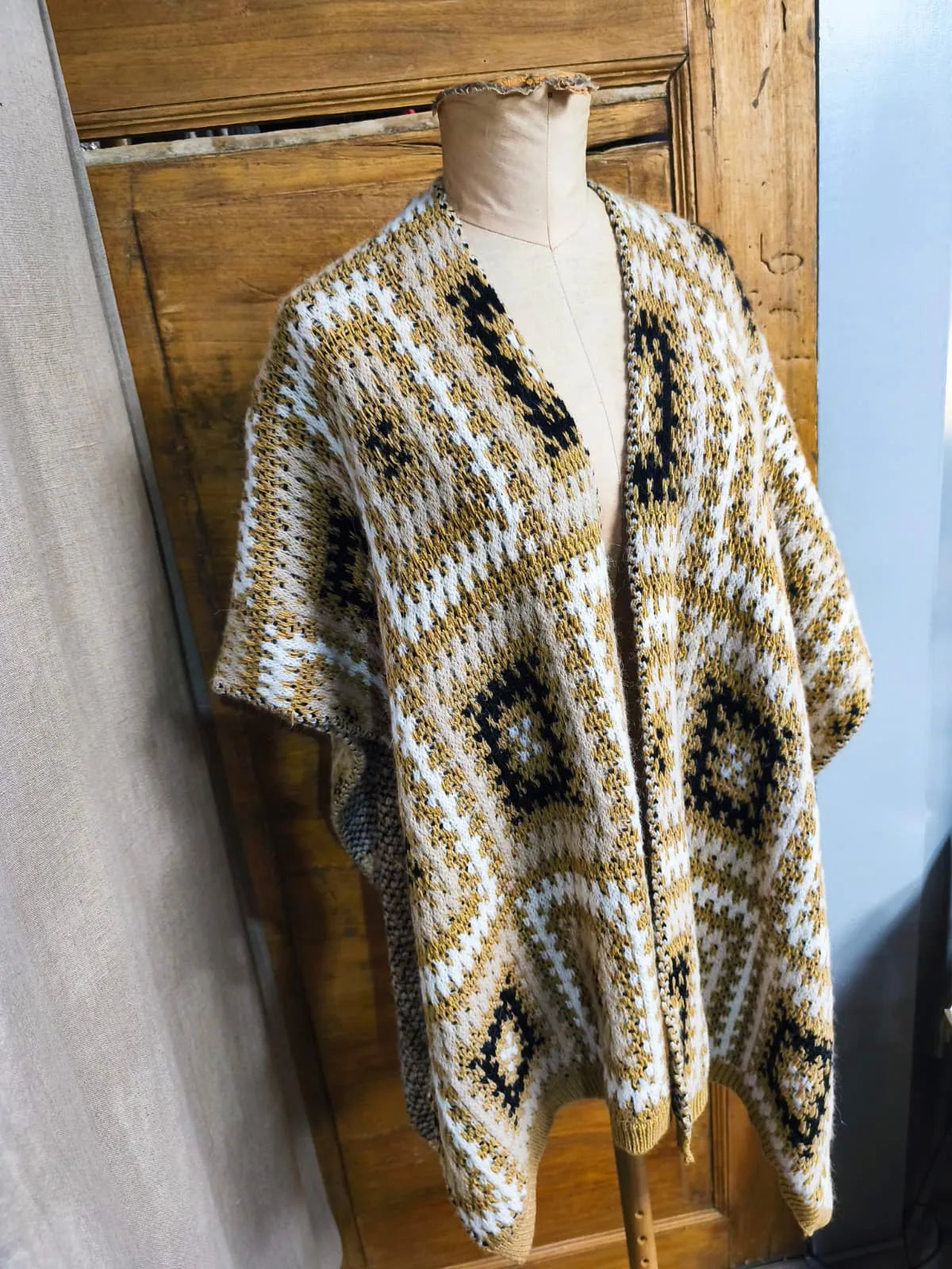 Mantella lana, sintetico ed alpaca